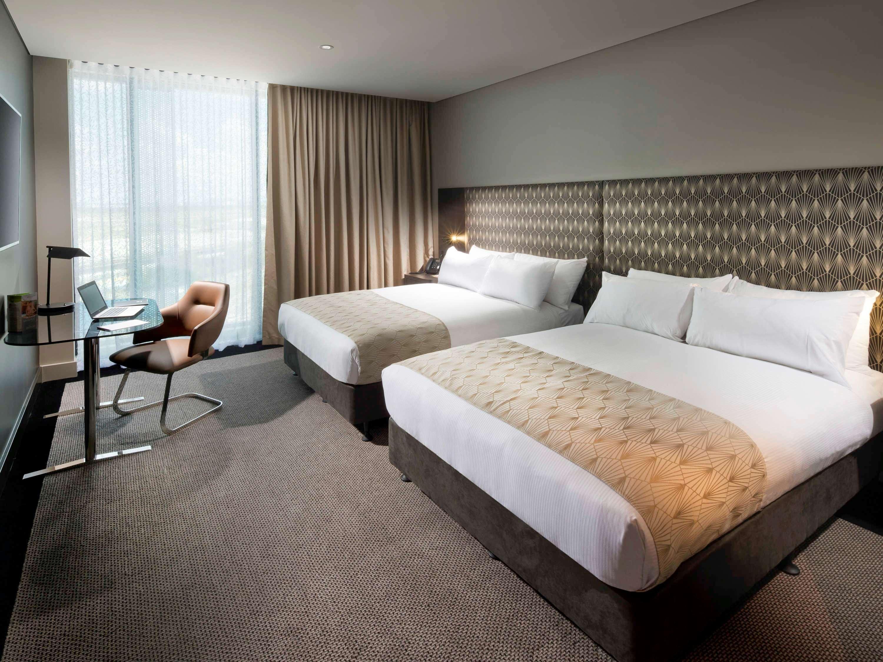 Pullman Brisbane Airport Hotel Exterior photo A room at the hotel