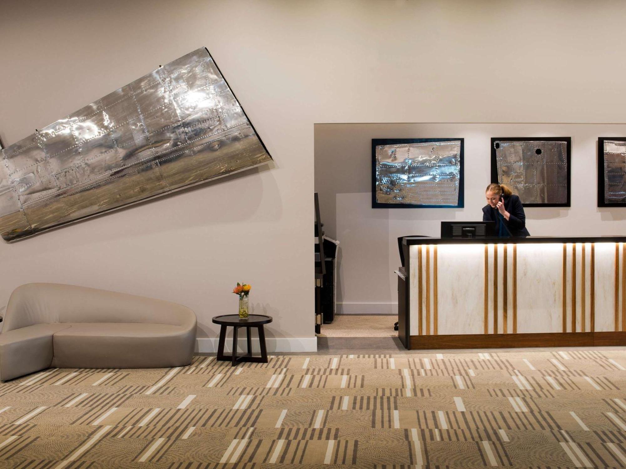 Pullman Brisbane Airport Hotel Exterior photo The reception area at the hotel