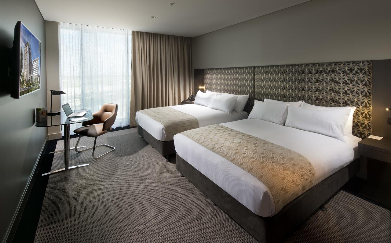 Pullman Brisbane Airport Hotel Exterior photo A room at the hotel