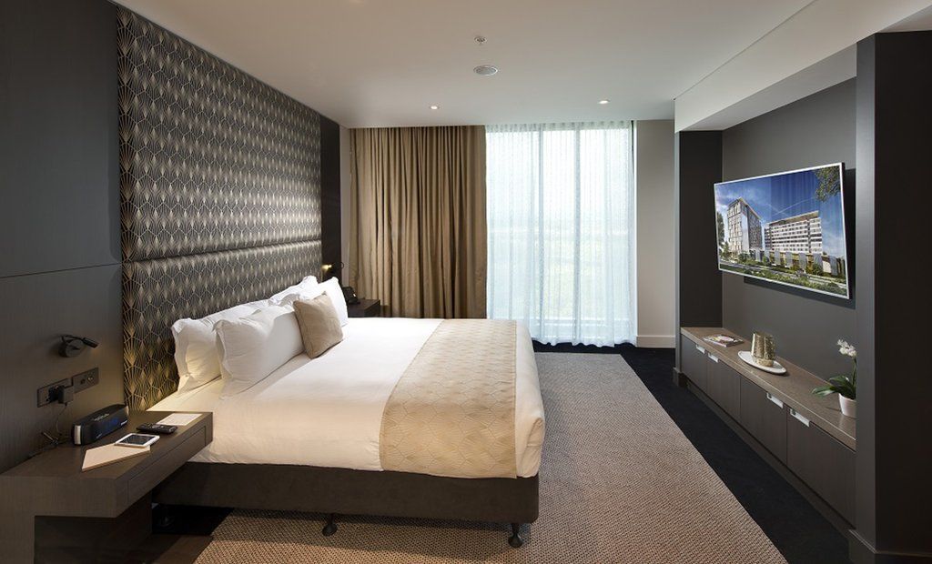 Pullman Brisbane Airport Hotel Exterior photo A bedroom at the hotel