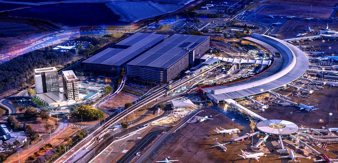 Pullman Brisbane Airport Hotel Exterior photo Aerial view of the airport at night