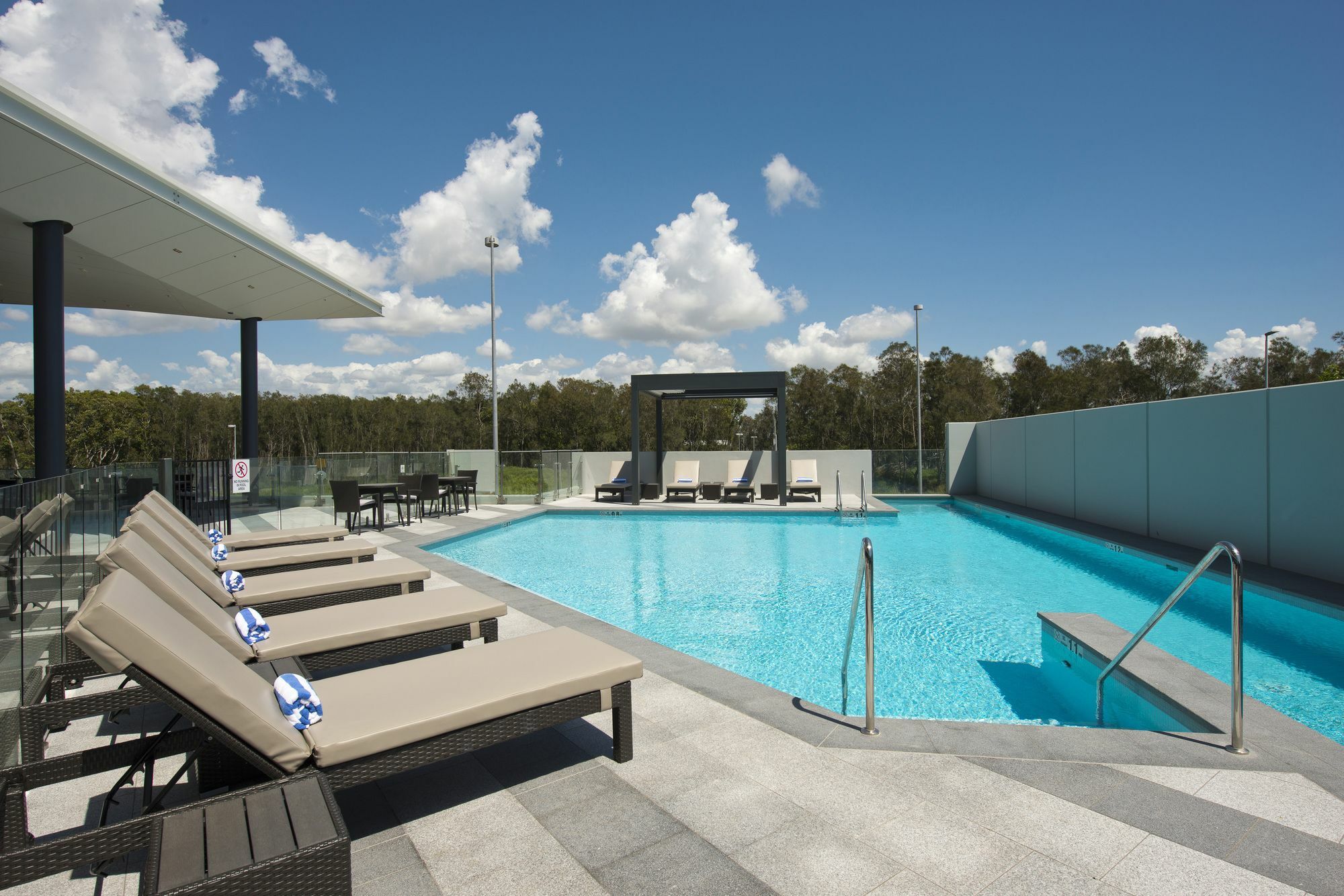 Pullman Brisbane Airport Hotel Exterior photo The rooftop pool at the Emporium Hotel South Bank